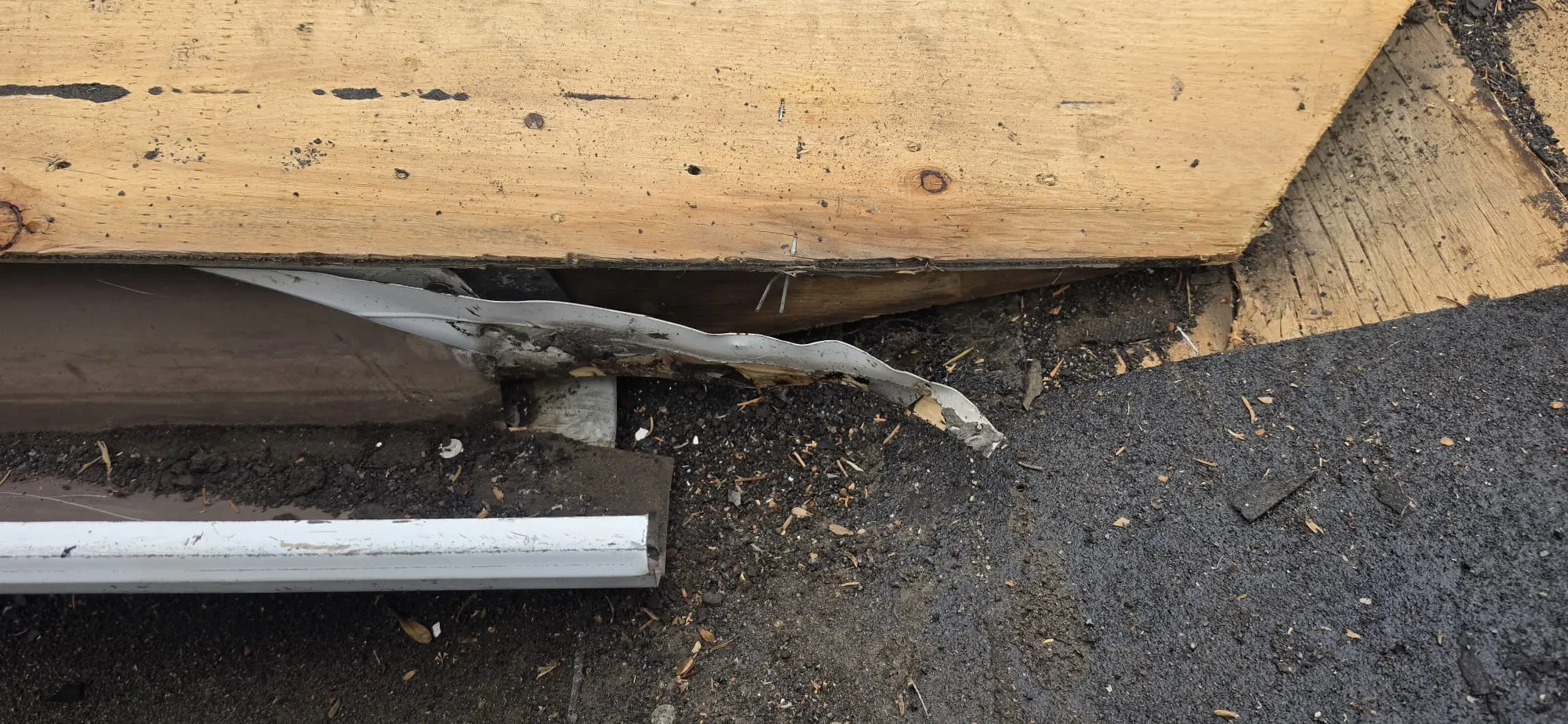 Bent drip edge rotted fascia repair in Calgary