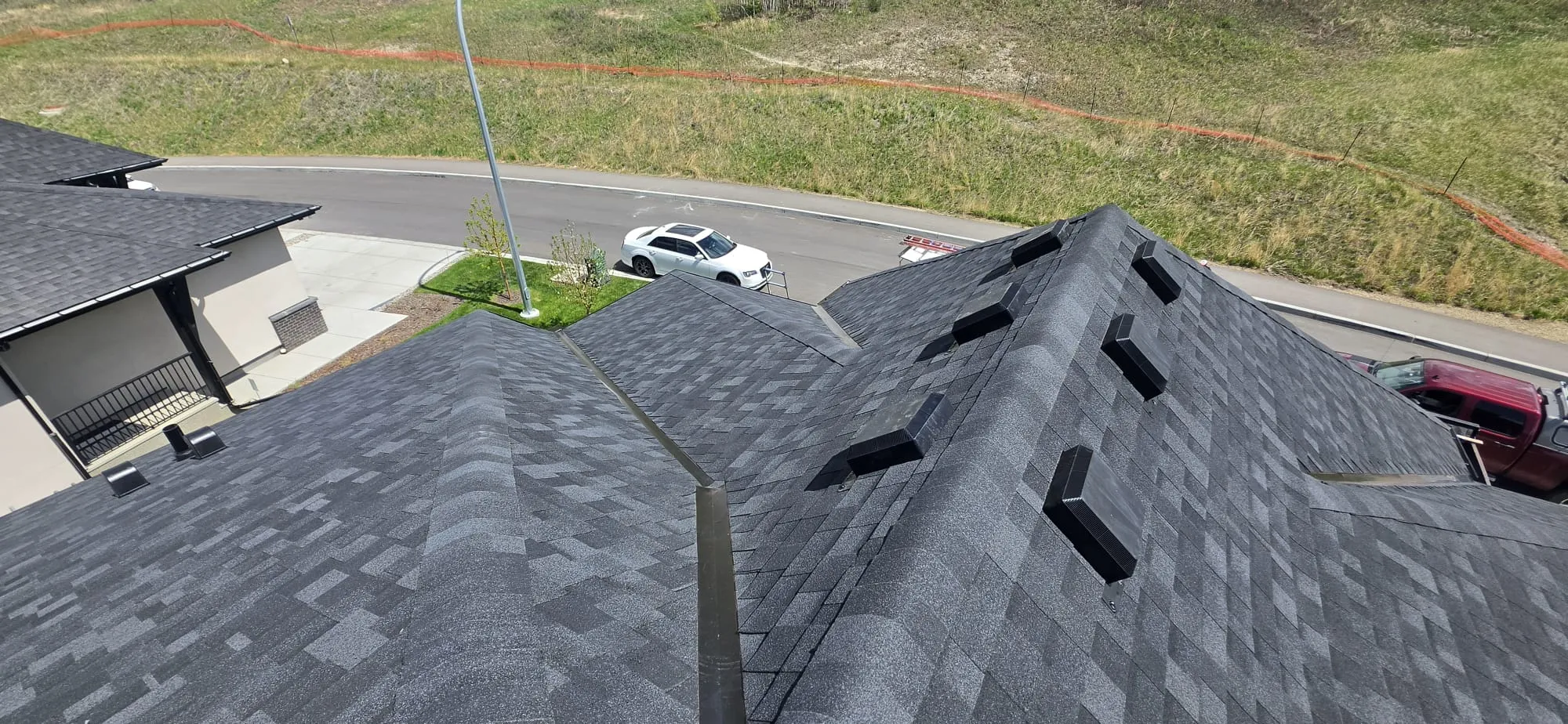 Black shingle roof box vents in Calgary