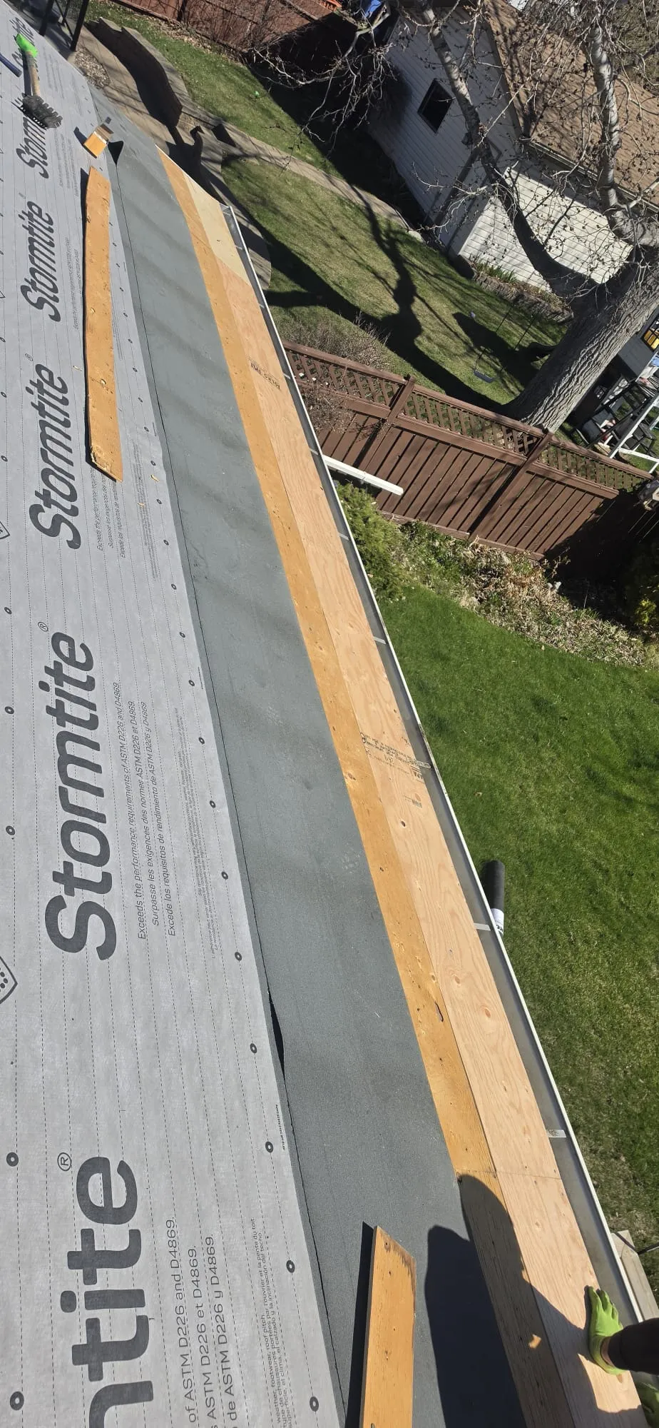 Roof deck underlayment shingle prep in Calgary